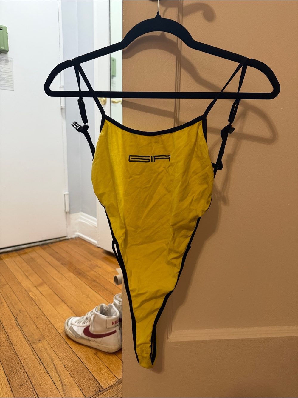 I.am.Gia High-Cut One-Piece body suit with Black Trim